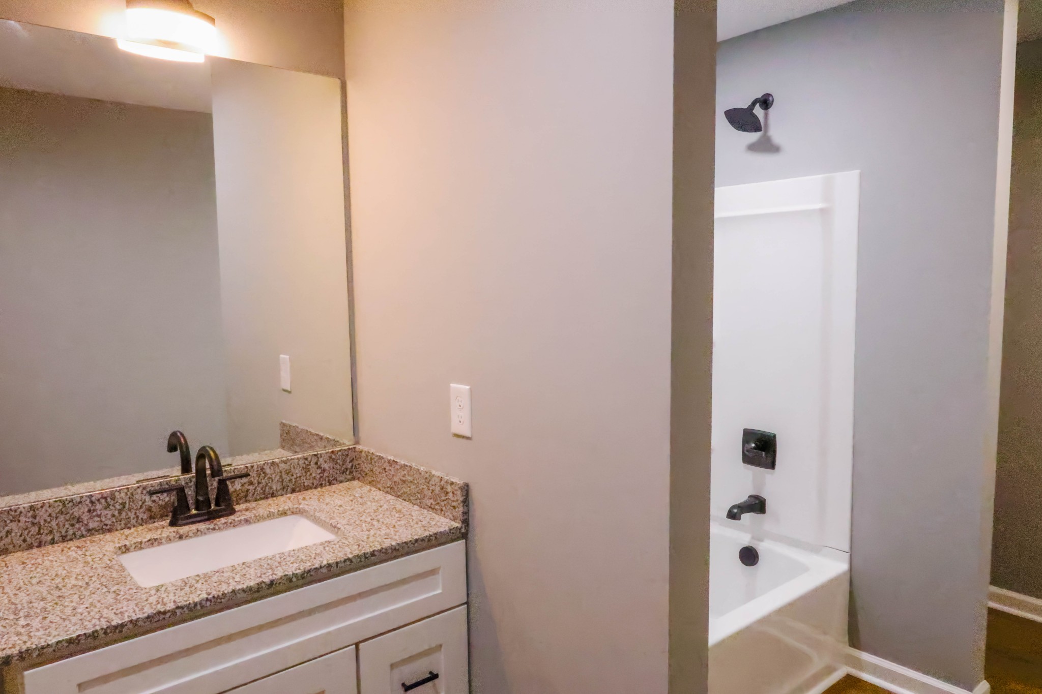 161 Vista Pointe Hohenwald, TN 38462 - Photo 37 of 43 a bathroom with a granite countertop sink and a mirror
