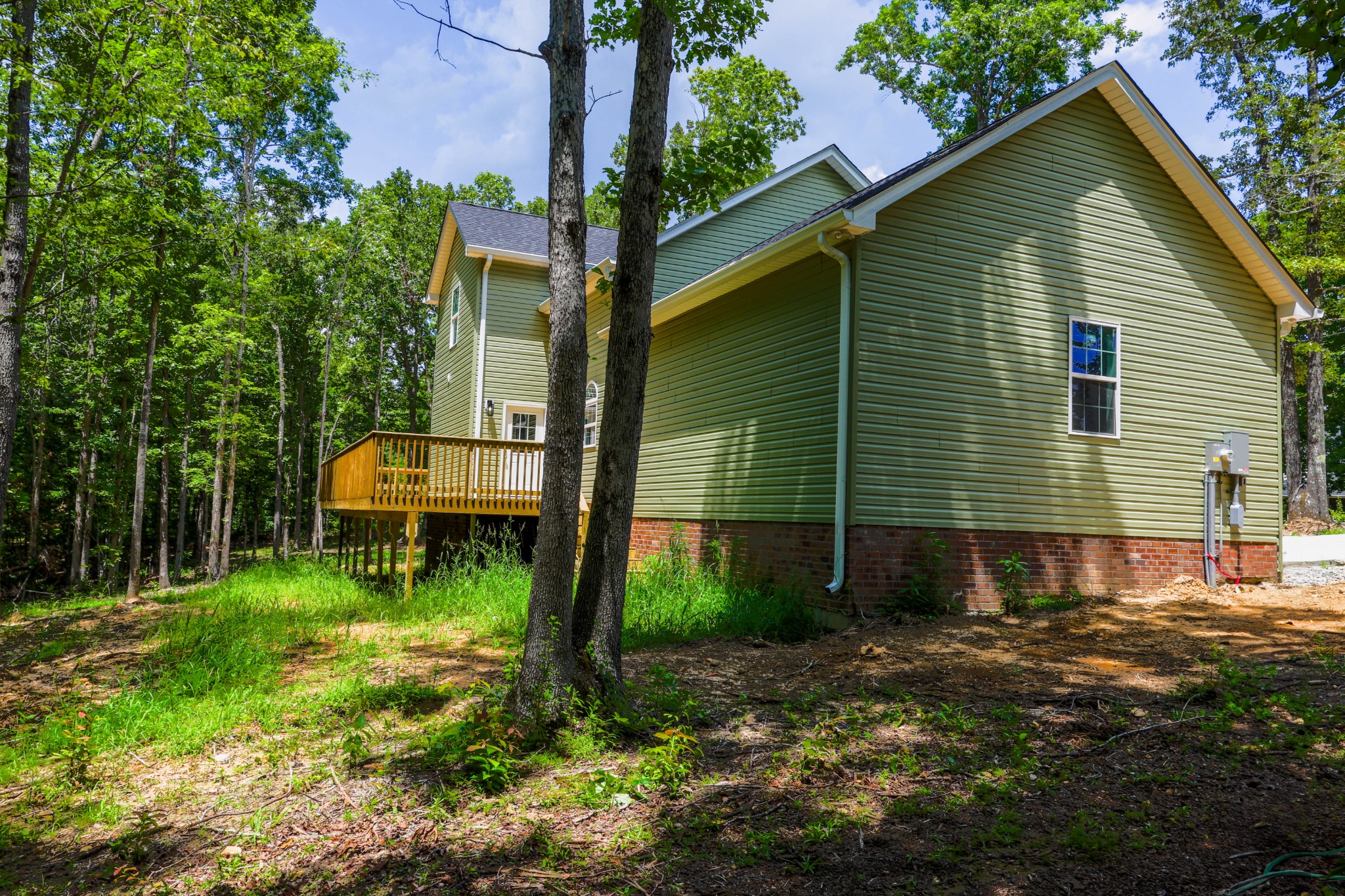 161 Vista Pointe Hohenwald, TN 38462 - Photo 5 of 43 a backyard of a house with lots of green space