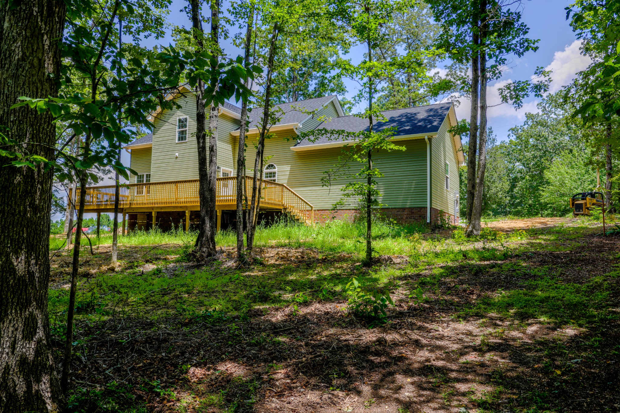 161 Vista Pointe Hohenwald, TN 38462 - Photo 7 of 43 a backyard of a house with lots of green space