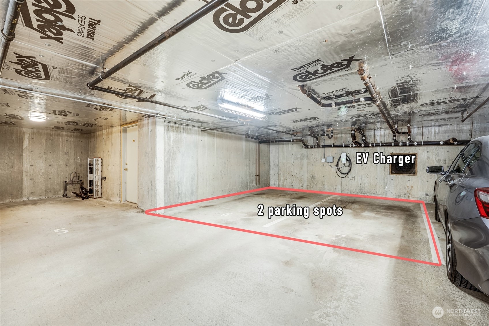 1110 West Howe Street, Unit 304 Seattle, WA 98119 - Photo 17 of 24 a view of a garage with projector