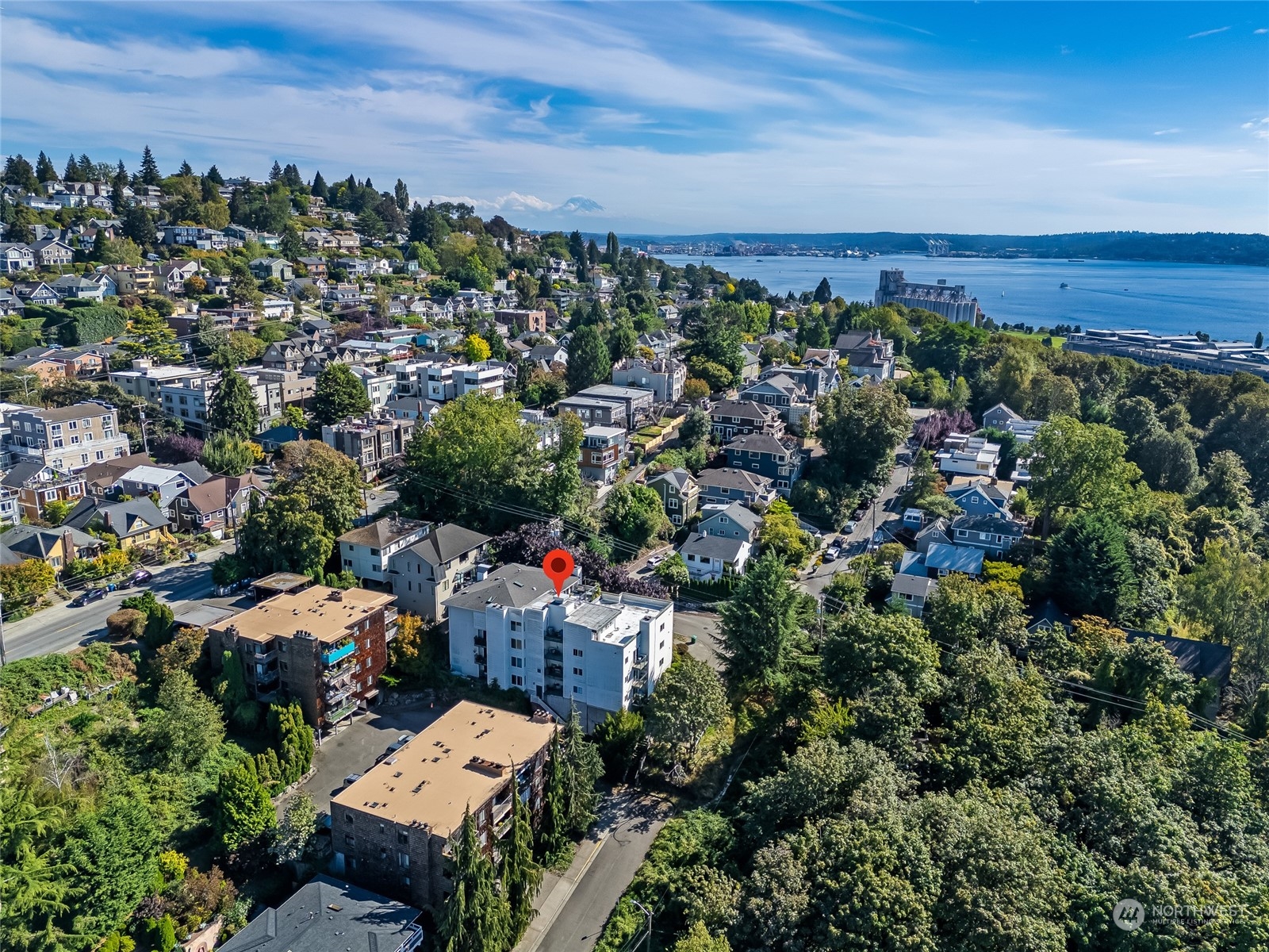 1110 West Howe Street, Unit 304 Seattle, WA 98119 - Photo 21 of 24 an aerial view of multiple house
