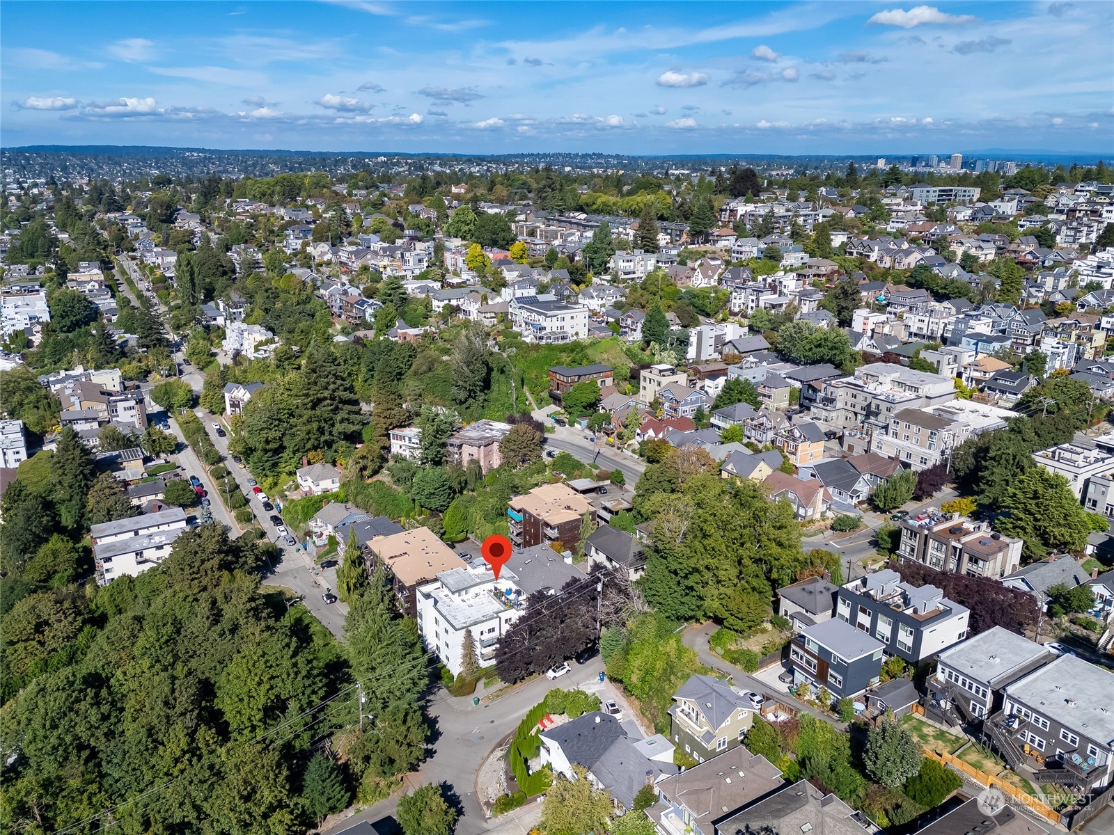1110 West Howe Street, Unit 304 Seattle, WA 98119 - Photo 22 of 24 a view of a city with lots of trees