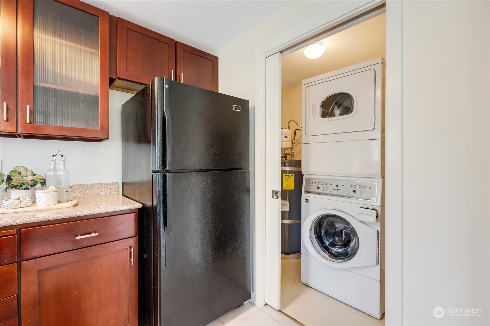 1110 West Howe Street, Unit 304 Seattle, WA 98119 - Photo 8 of 24 a utility room with dryer and washer