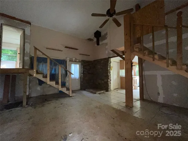 a view of an empty room and window