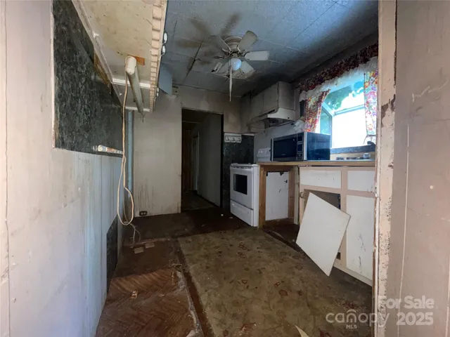 a view of a room with a large window