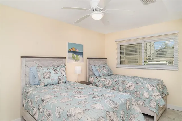 a bathroom with a toilet a sink and a shower