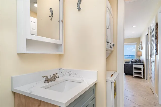 a view of a swimming pool and outdoor seating