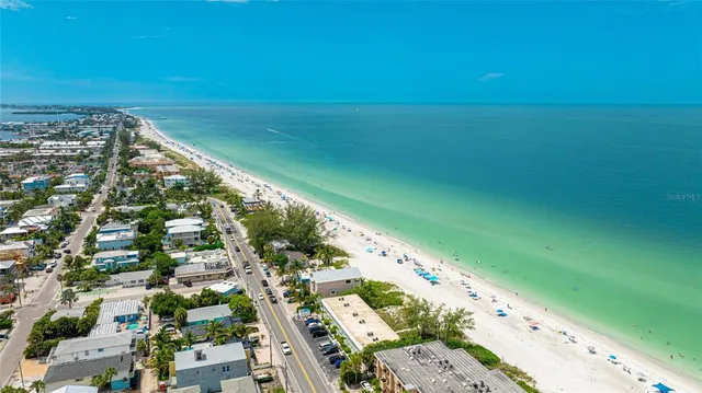 a view of a lake with a city
