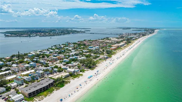 front view of a building with a garden