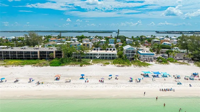 a front view of a house with parking area