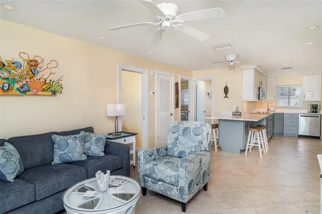 a bedroom with a large bed and a large window