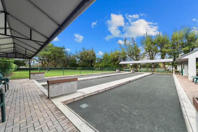 a view of a swimming pool with a patio