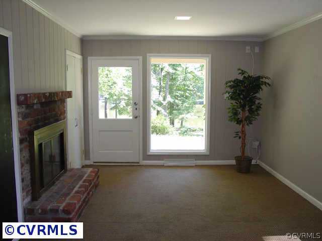 4323 Croatan Road Richmond, VA 23235 - Photo 8 of 9 Other - Recreation room has fireplace with brick m