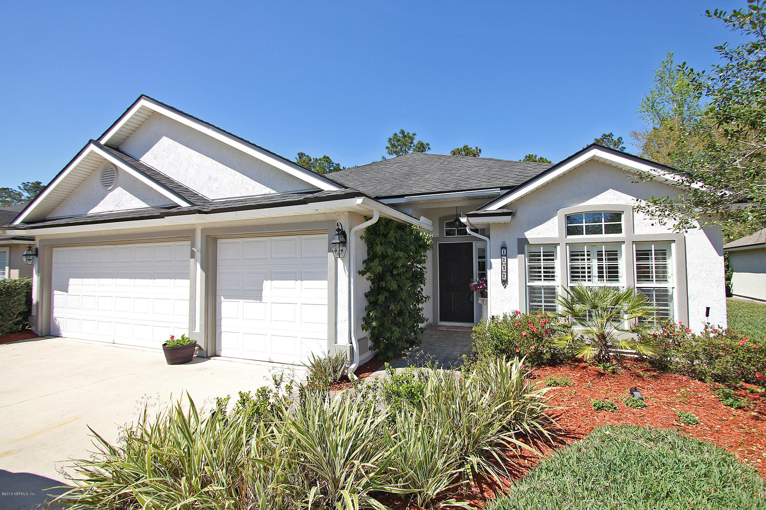 1232 Ribbon Road St. Johns, FL 32259 - Photo 1 of 27 a front view of a house with a yard