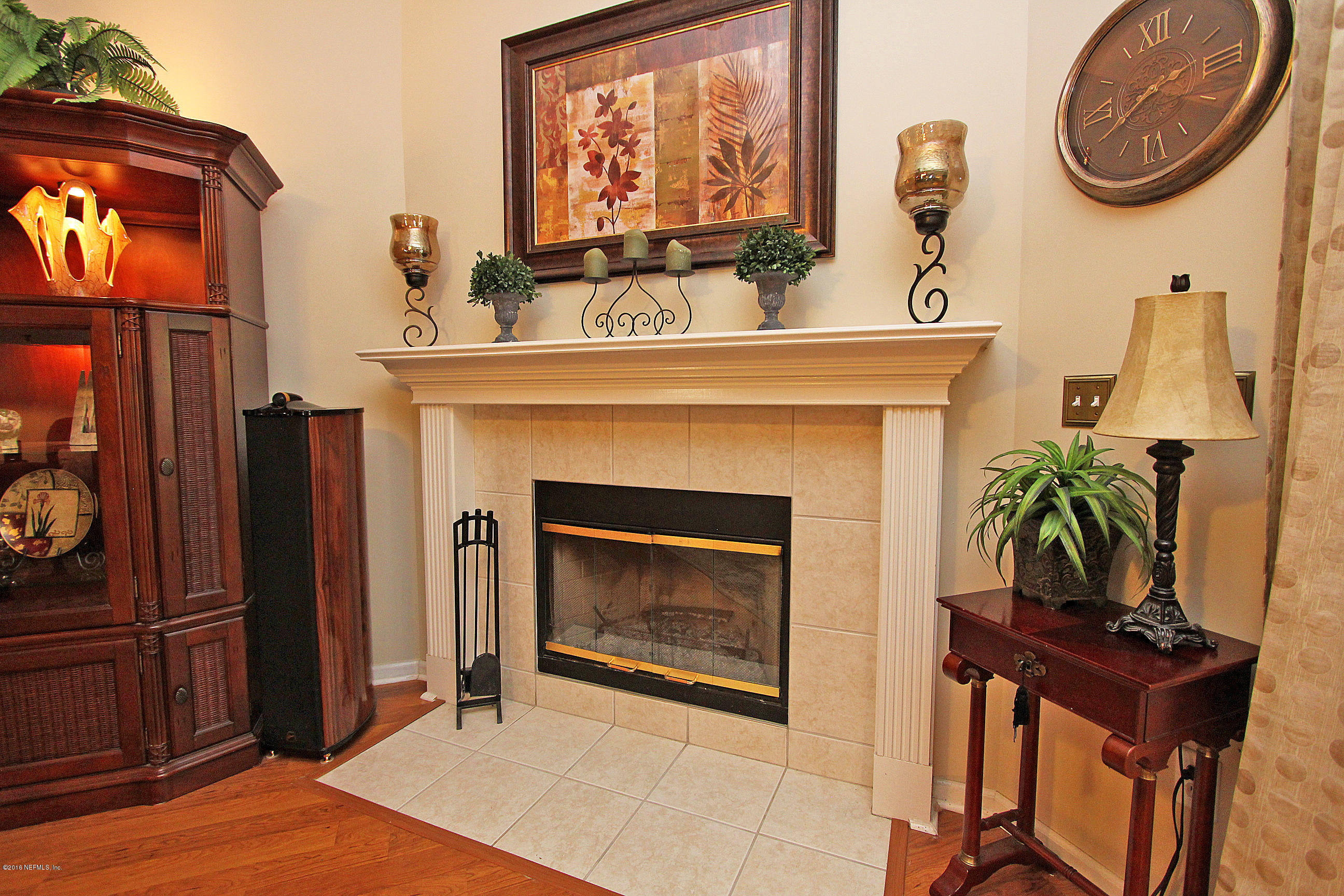 1232 Ribbon Road St. Johns, FL 32259 - Photo 12 of 27 a view of a livingroom with furniture and a fireplace
