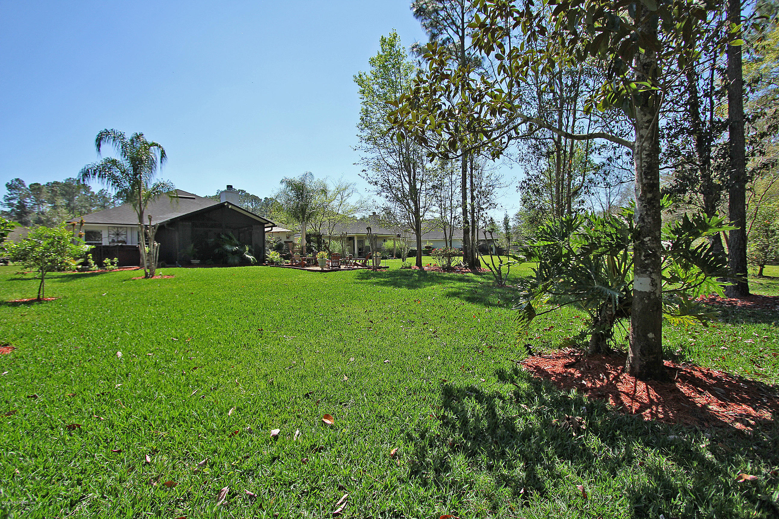 1232 Ribbon Road St. Johns, FL 32259 - Photo 26 of 27 a view of a house with a yard