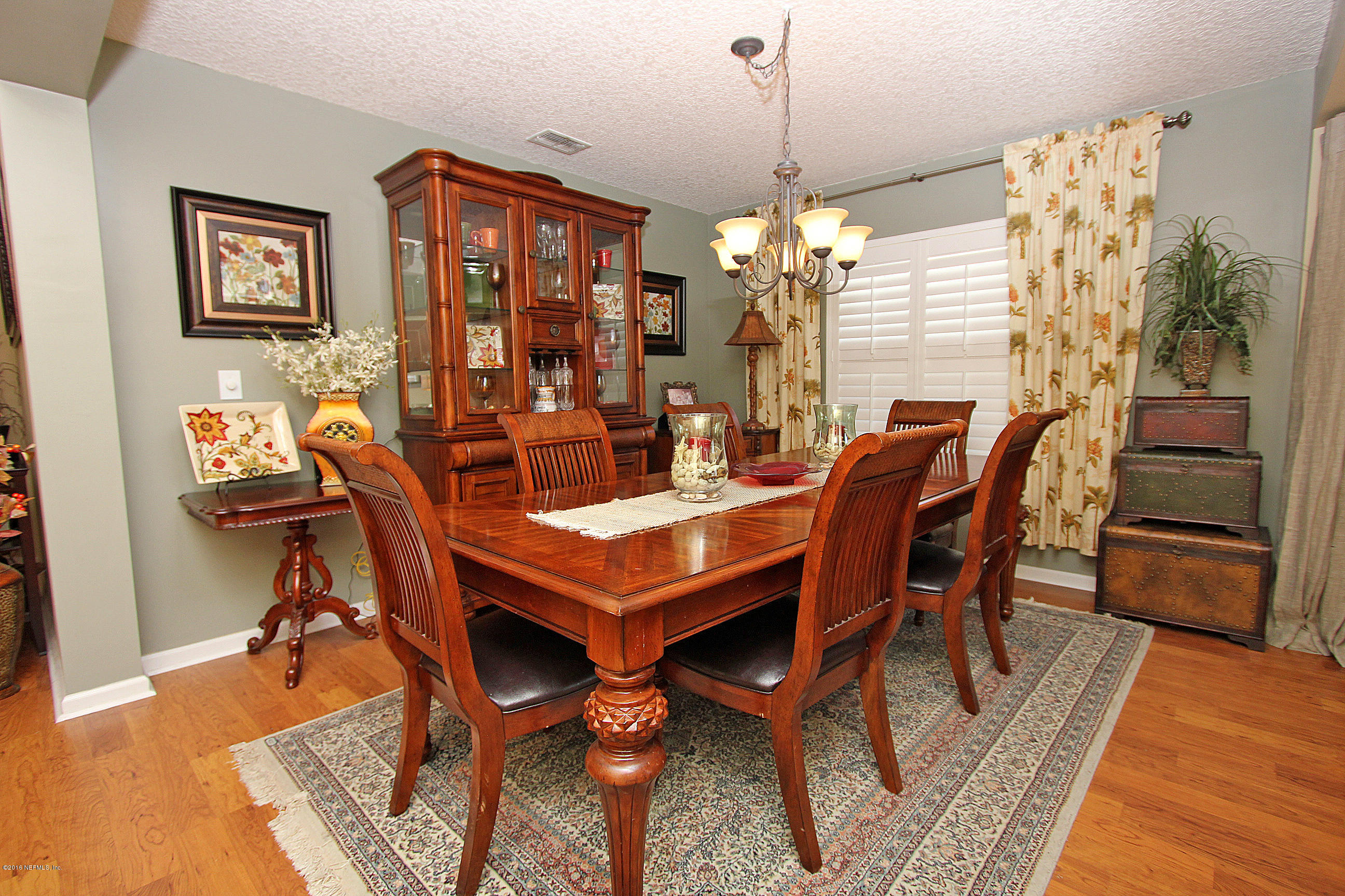 1232 Ribbon Road St. Johns, FL 32259 - Photo 6 of 27 a view of a dining room with furniture