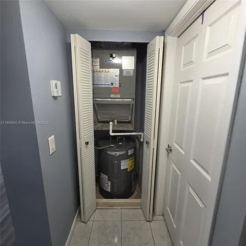 a bathroom with a glass door shower