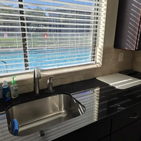 a view of workspace with cabinets