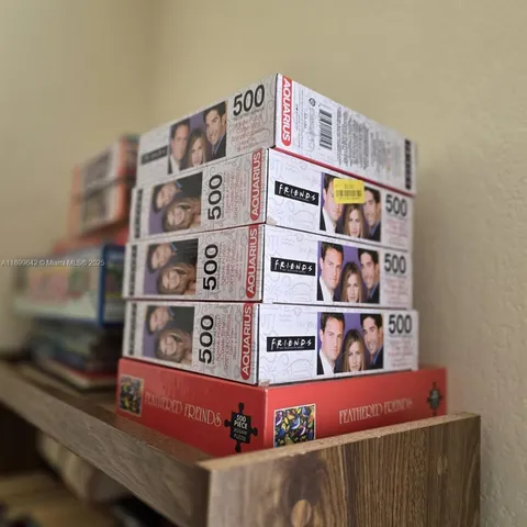 a view of a dining room with furniture and a window