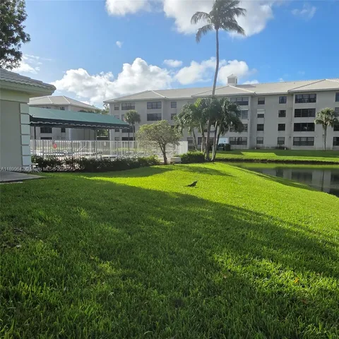 a view of swimming pool of water with outdoor seating