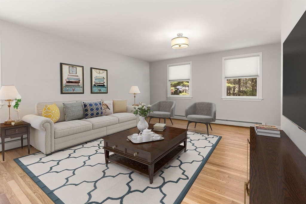 336 Sharpners Pond Road North Andover, MA 01845 - Photo 15 of 42 a living room with furniture and wooden floor