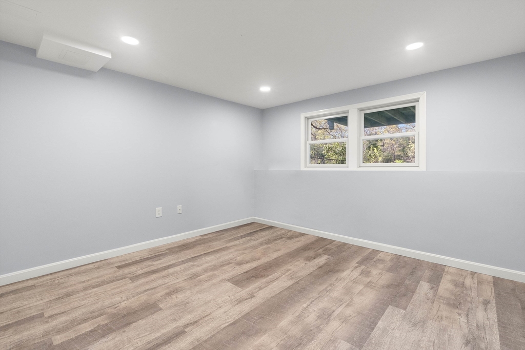 336 Sharpners Pond Road North Andover, MA 01845 - Photo 29 of 42 an empty room with windows