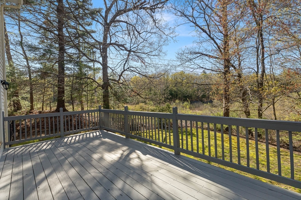 336 Sharpners Pond Road North Andover, MA 01845 - Photo 35 of 42 a balcony with trees in front of it