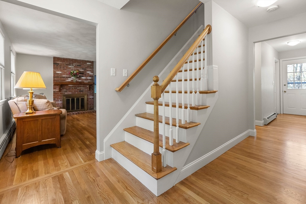 336 Sharpners Pond Road North Andover, MA 01845 - Photo 4 of 42 a view of entryway with wooden floor
