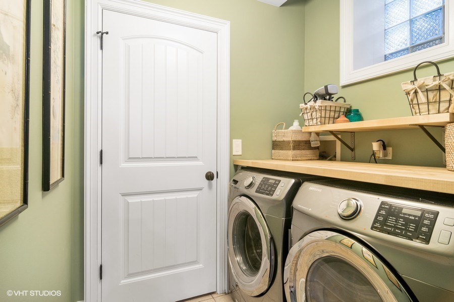 2002 West Barry Avenue Chicago, IL 60618 - Photo 17 of 25 a utility room with dryer and washer