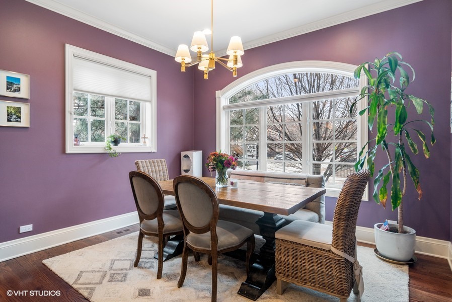 2002 West Barry Avenue Chicago, IL 60618 - Photo 5 of 25 a view of a dining room with furniture window and chandelier