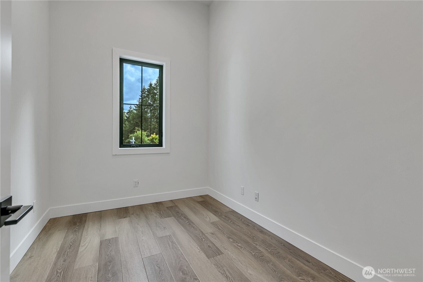 6709 254th Street East Graham, WA 98338 - Photo 30 of 40 a view of a room that has a window in it