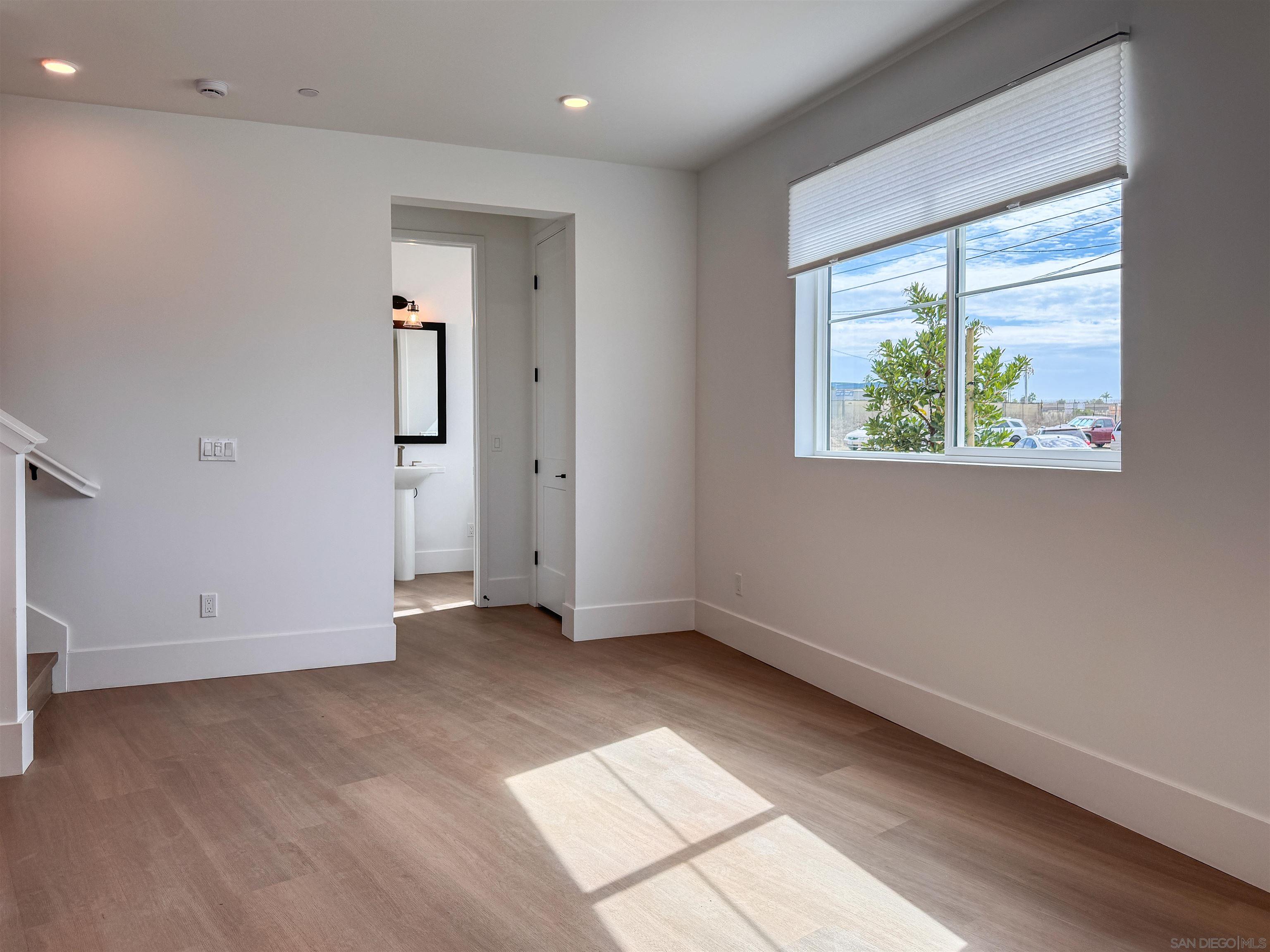7290 Ponto Drive, Unit 7302 Carlsbad, CA 92011 - Photo 15 of 54 an empty room with windows