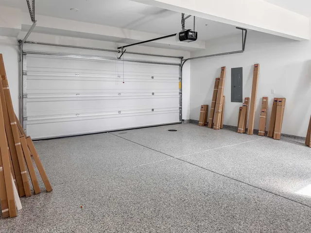 a bathroom with double vanity sinks and a mirror