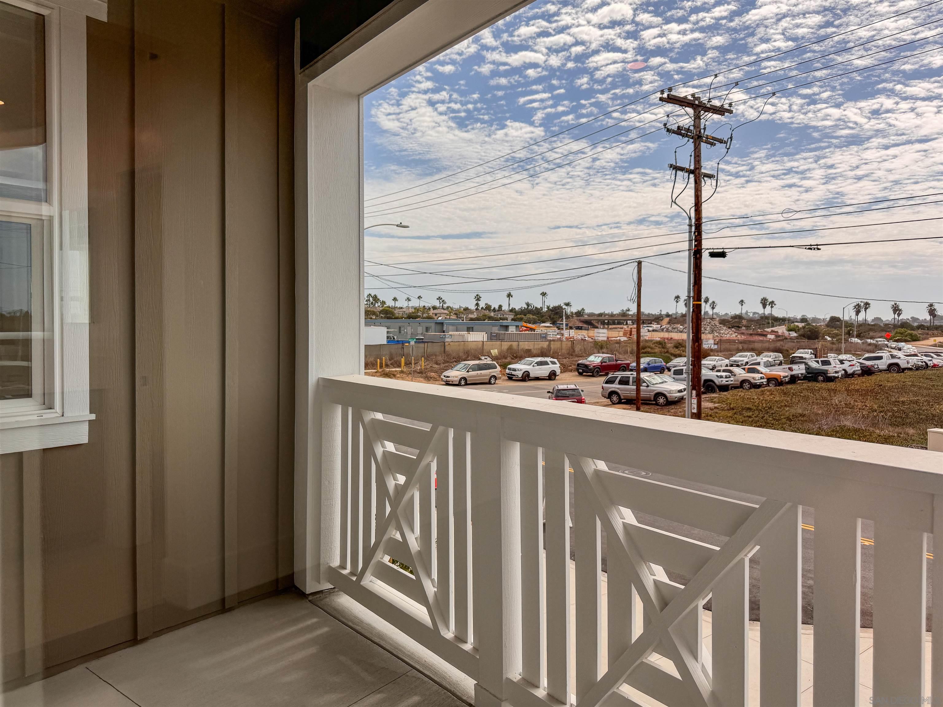 7290 Ponto Drive, Unit 7302 Carlsbad, CA 92011 - Photo 23 of 54 a balcony with street view