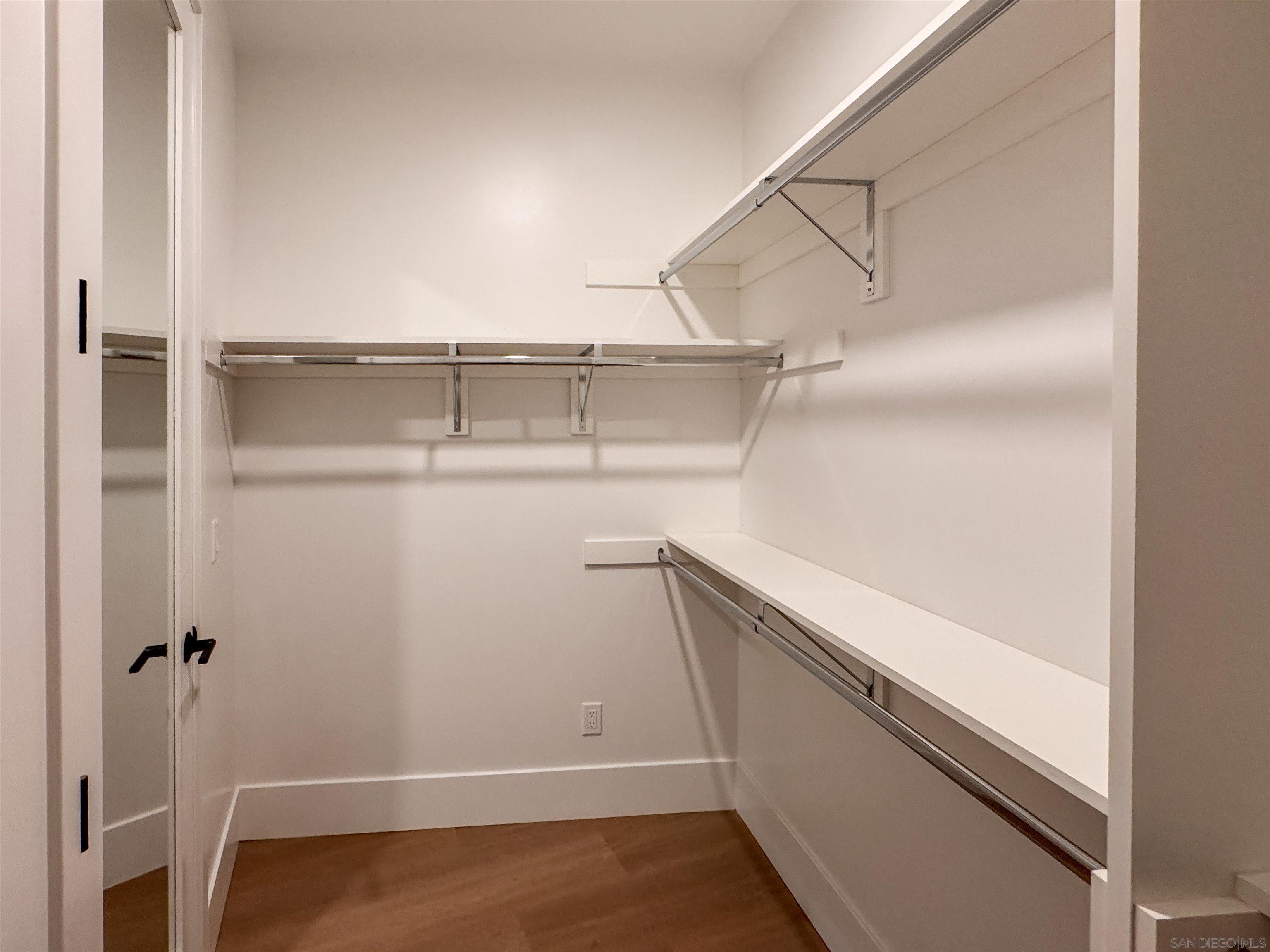 7290 Ponto Drive, Unit 7302 Carlsbad, CA 92011 - Photo 49 of 54 a view of an empty walk in closet