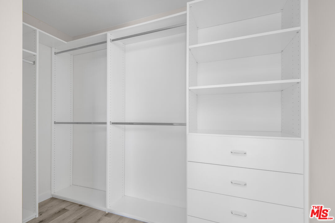 1226 South Bedford Street, Unit 504 Los Angeles, CA 90035 - Photo 15 of 16 a view of walk in closet