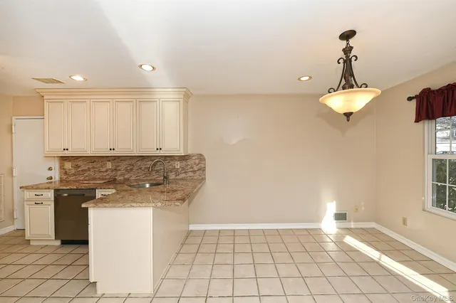 $729,000 | 104 Lakebridge Drive North, Kings Park, NY 11754