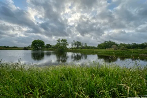 a view of a lake with a outdoor space