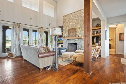 a view of balcony with wooden floor and lake view