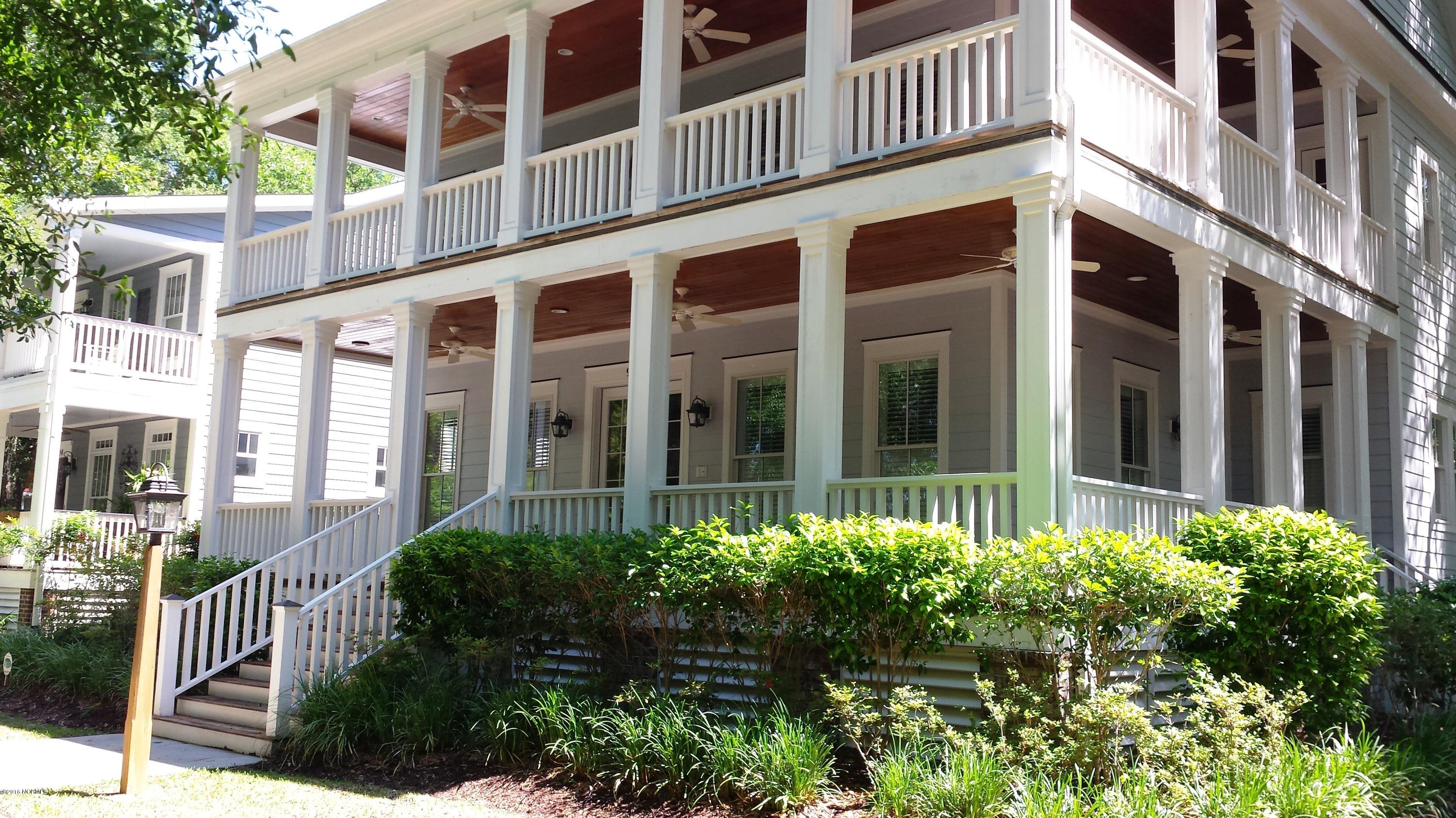 9200 Horseshoe Lake Road Southwest Calabash, NC 28467 - Photo 2 of 49 Wraparound porches on two levels