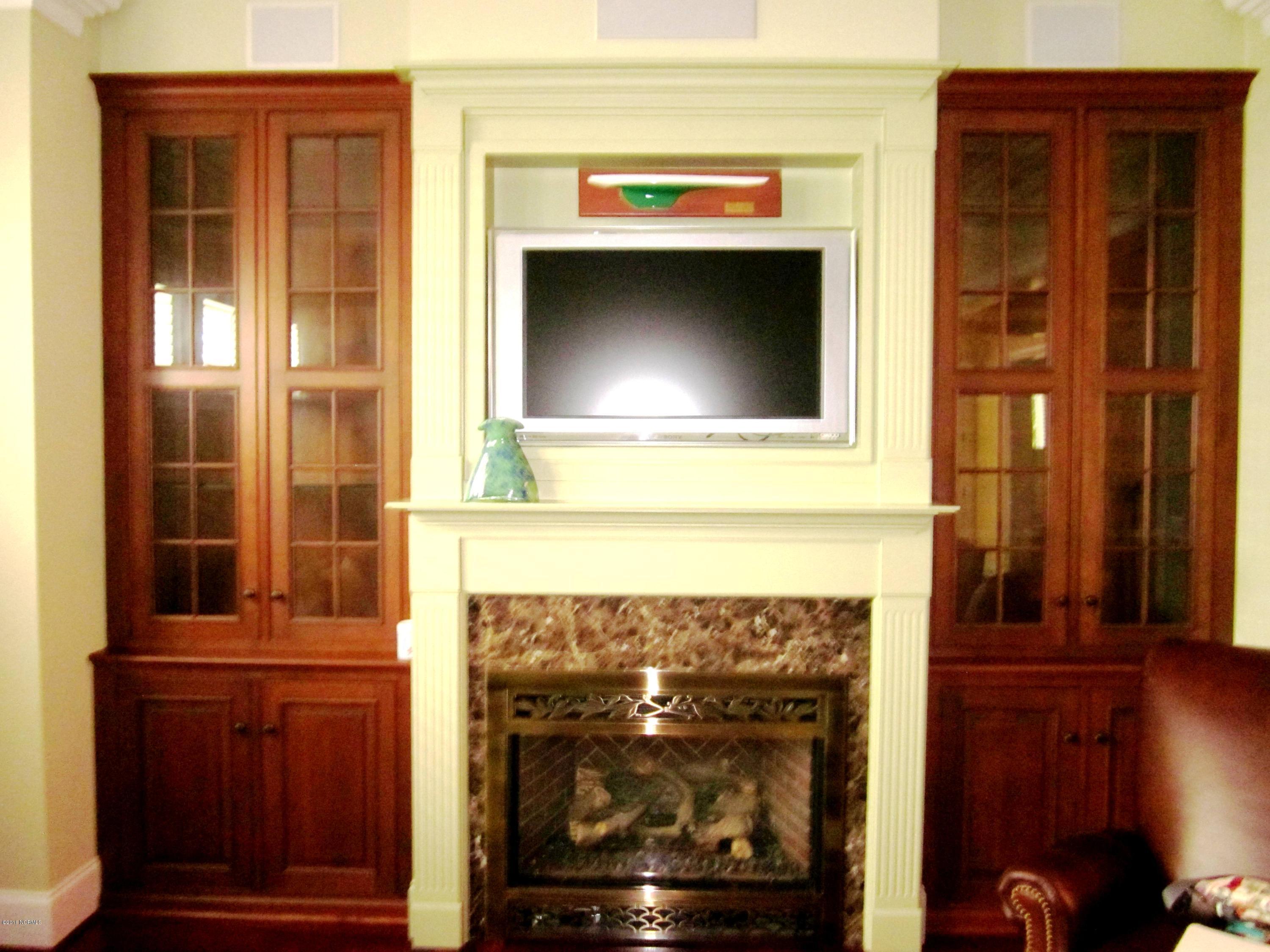 9200 Horseshoe Lake Road Southwest Calabash, NC 28467 - Photo 23 of 49 Custom marble fireplace with built-ins