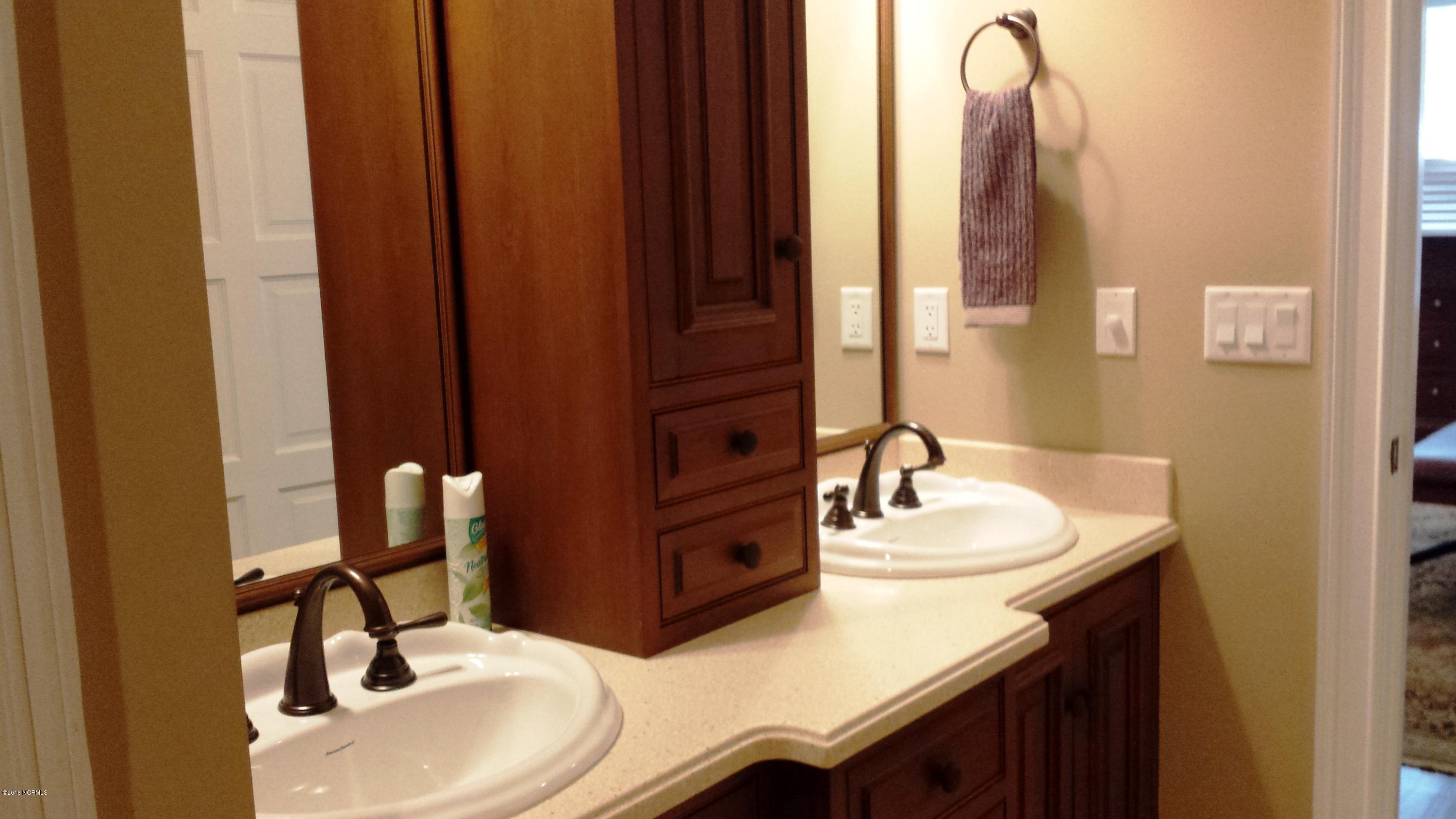 9200 Horseshoe Lake Road Southwest Calabash, NC 28467 - Photo 28 of 49 Master suite with double vanity