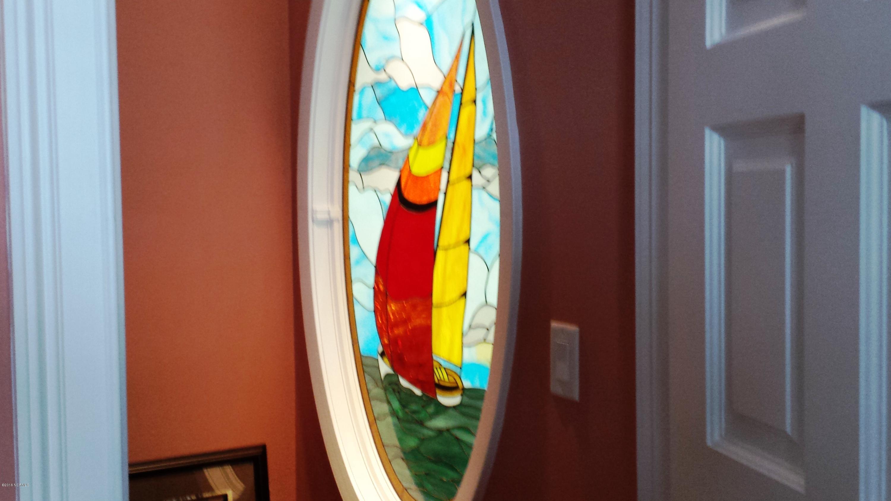 9200 Horseshoe Lake Road Southwest Calabash, NC 28467 - Photo 34 of 49 Stained glass accent window in walk-in closet
