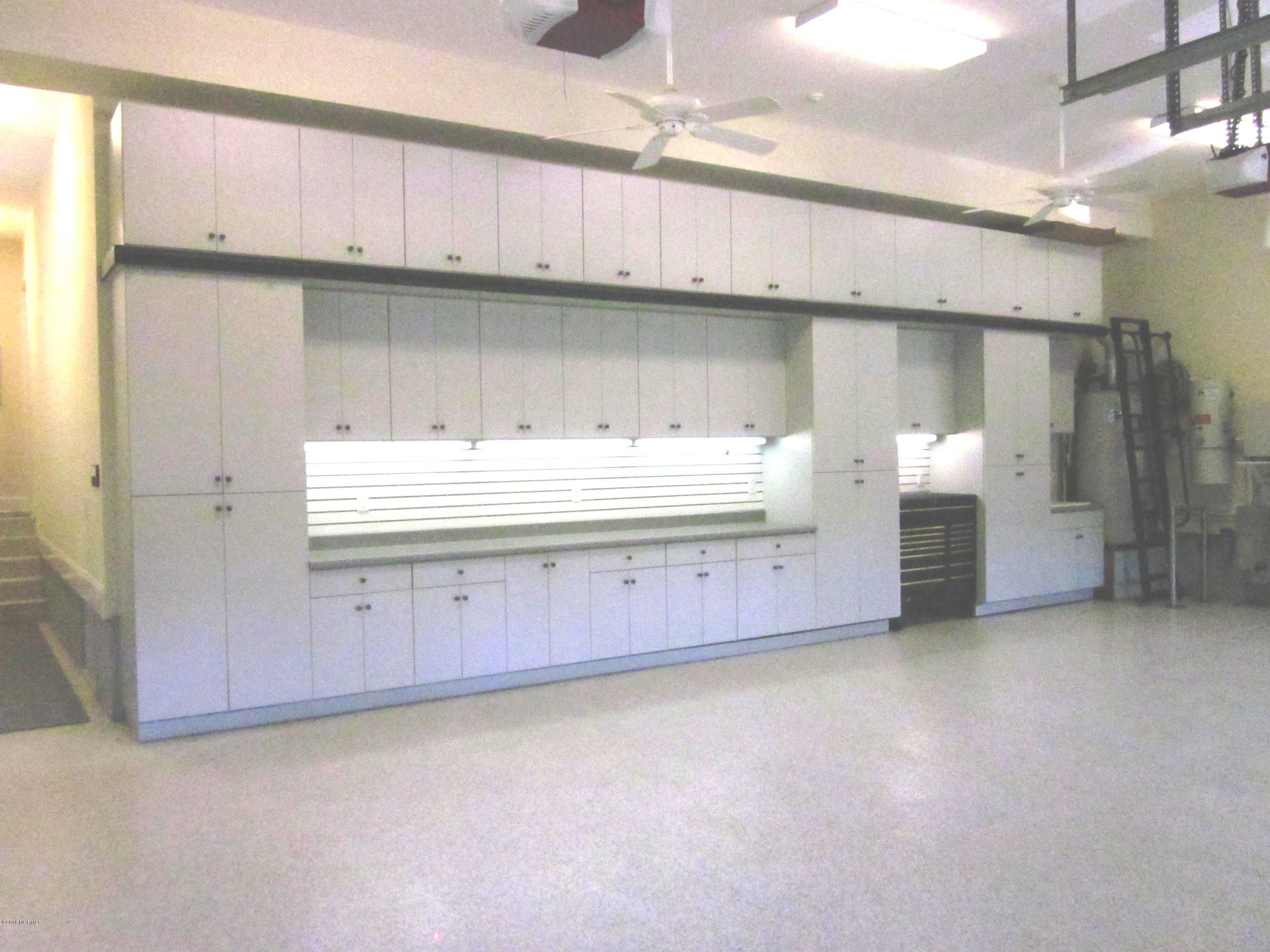 9200 Horseshoe Lake Road Southwest Calabash, NC 28467 - Photo 46 of 49 Garage with cabinet storage