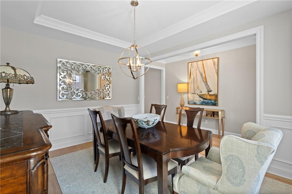 4469 Tacoma Trace Suwanee, GA 30024 - Photo 11 of 62 a view of a dining room with furniture window and outside view