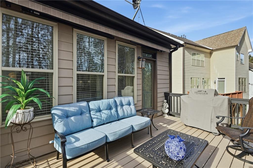 4469 Tacoma Trace Suwanee, GA 30024 - Photo 41 of 62 a outdoor living space with furniture and a potted plant