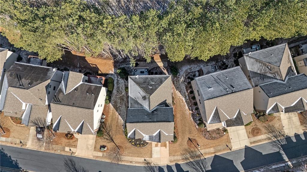 4469 Tacoma Trace Suwanee, GA 30024 - Photo 45 of 62 an aerial view of multiple houses with yard