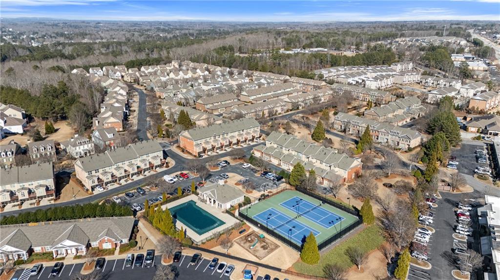4469 Tacoma Trace Suwanee, GA 30024 - Photo 46 of 62 an aerial view of residential house with outdoor space