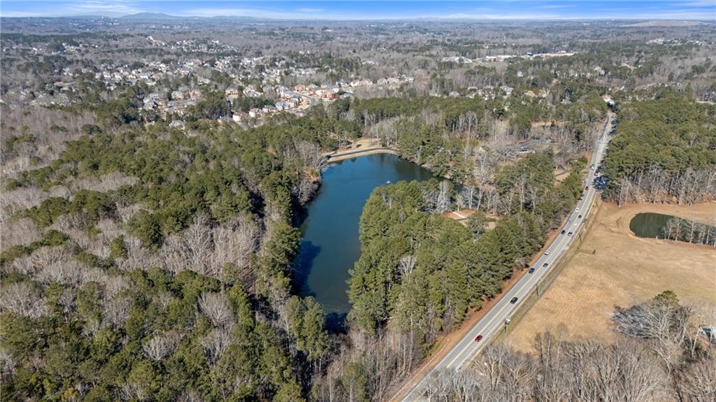 4469 Tacoma Trace Suwanee, GA 30024 - Photo 47 of 62 an aerial view of a house with a yard